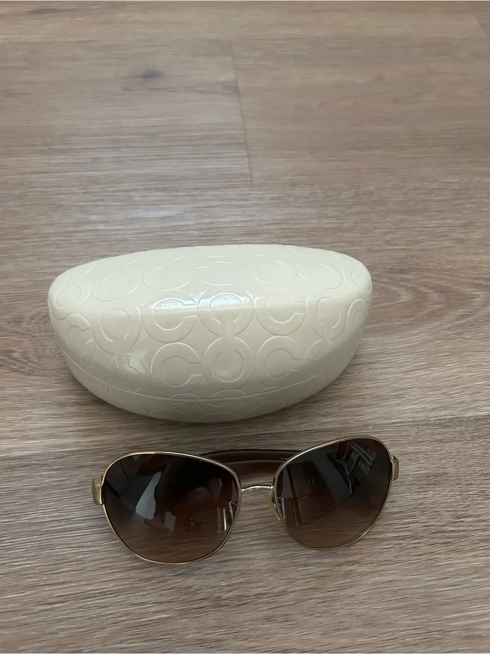 Coach Gold Frame Sunglasses with Brown Gradient Lenses